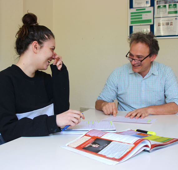 Student and teacher in classroom
